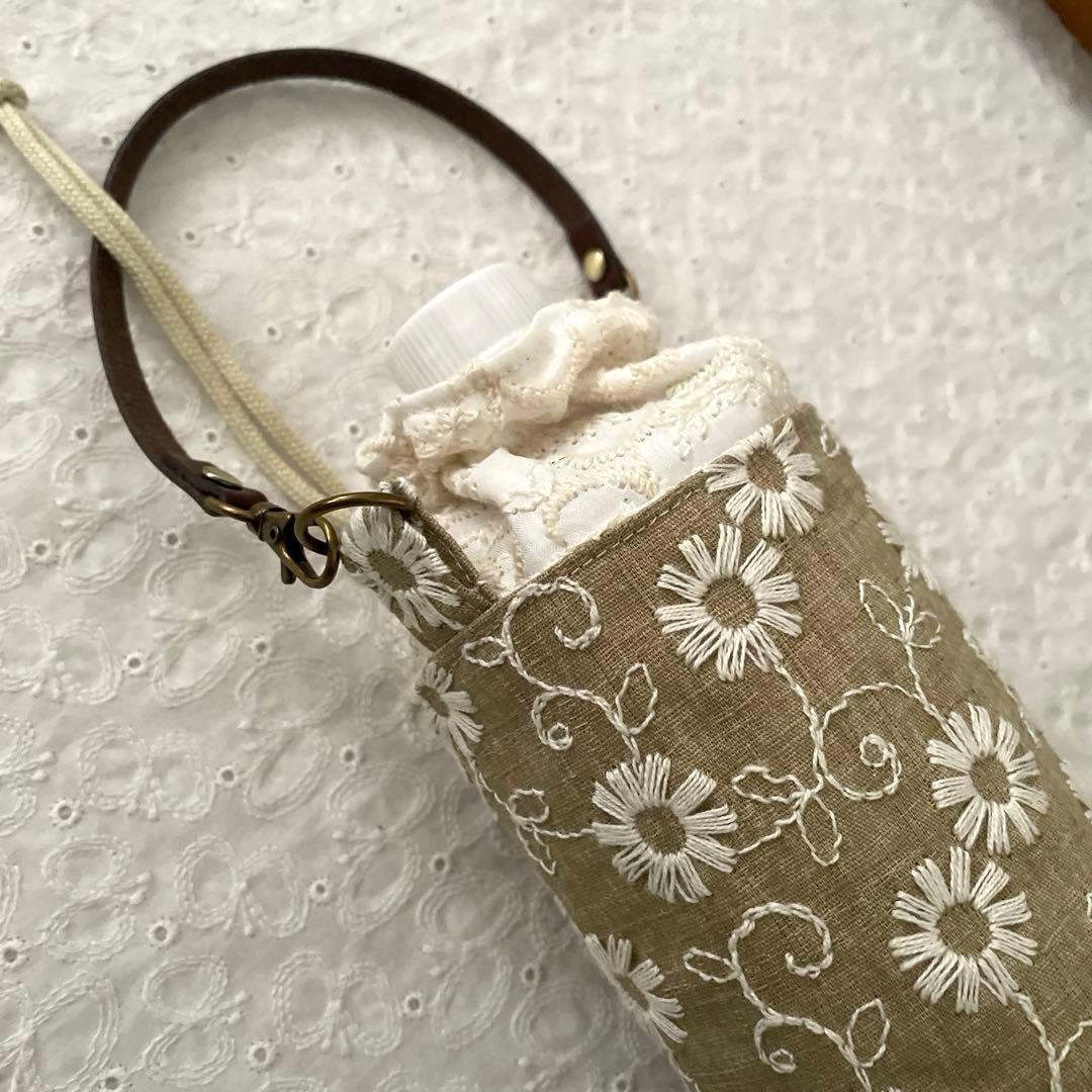 刺繍生地のペットボトルカバー　ハンドメイド　ベージュ　花刺繍柄　P76