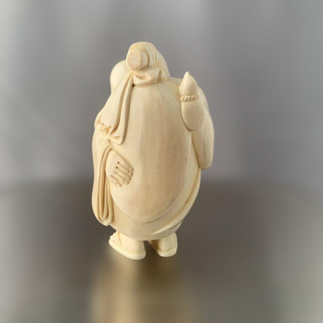 【詳細不明】時代物　置物　瓢箪のようなものを担ぐ男