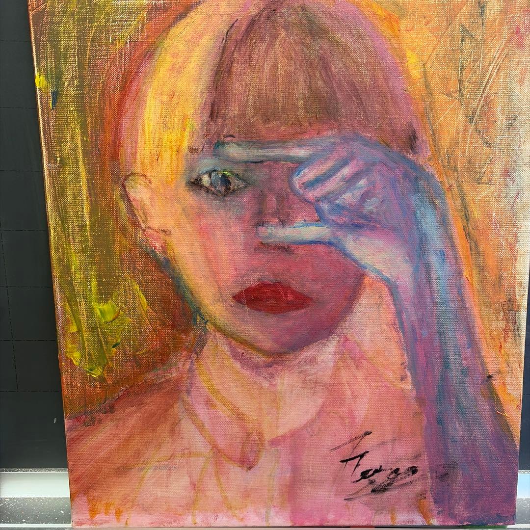 リアルな目と手の絵画